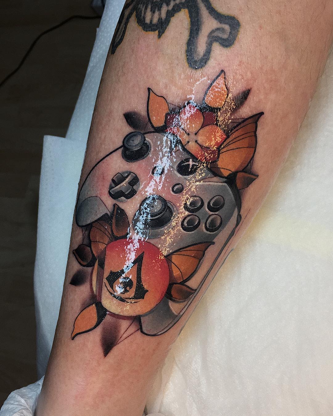 Custom video game tattoo by Sasha Akulov in Espoo 2